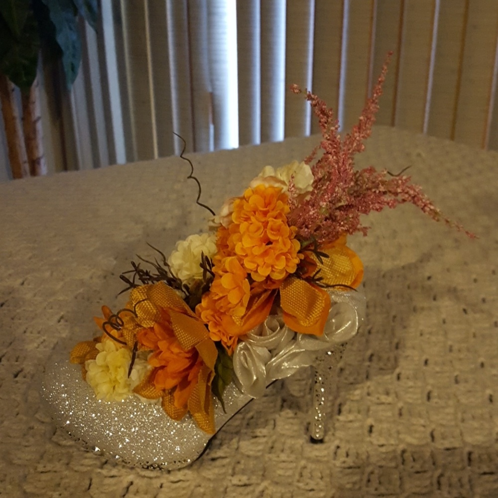 Decorative shoe with flowers.